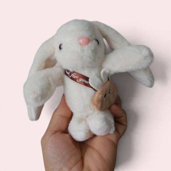 Llavero de peluche suave de conejito blanco con bolsito marrón Llavero de peluche suave de conejito blanco con bolsito marrón